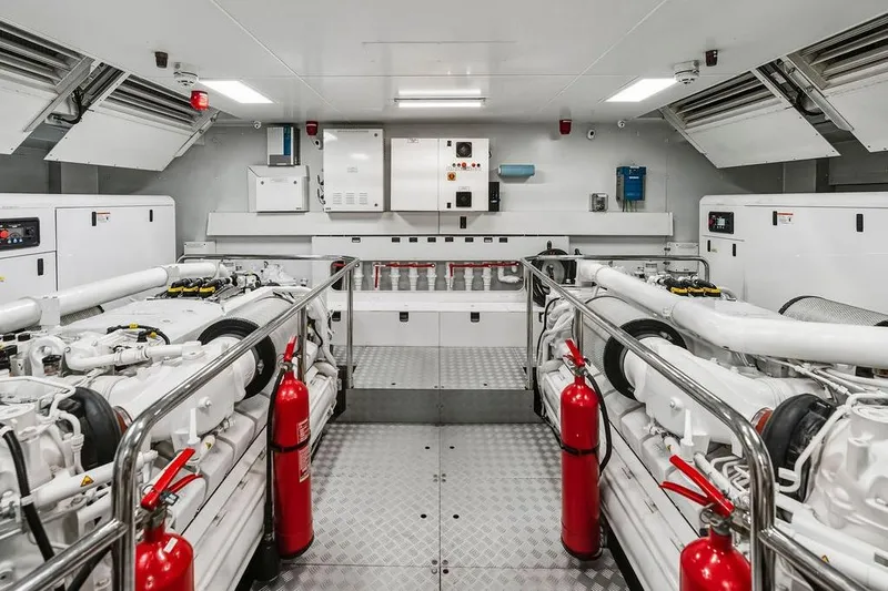 Randy Beth Yacht Photos Pics Engine room of 2018 Custom Line 120 yacht with modern equipment and safety features.
