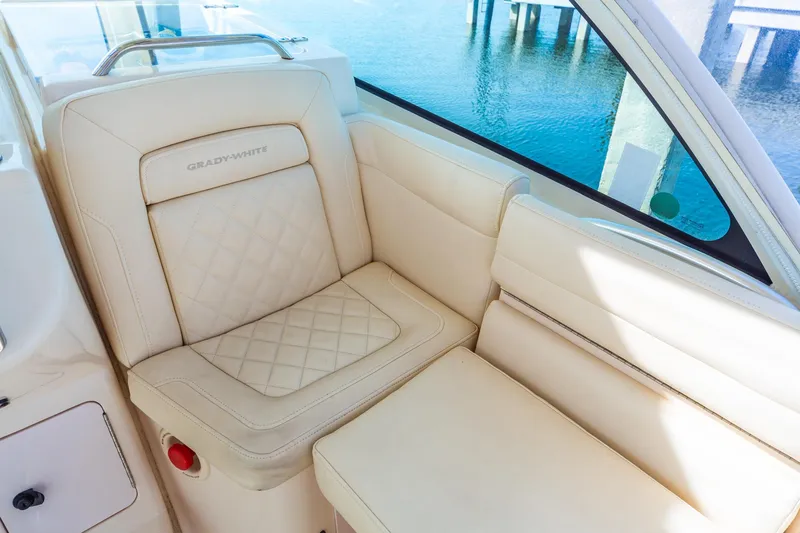  Yacht Photos Pics Luxury seating on 2020 Grady-White 370 Express boat, featuring elegant cream upholstery.