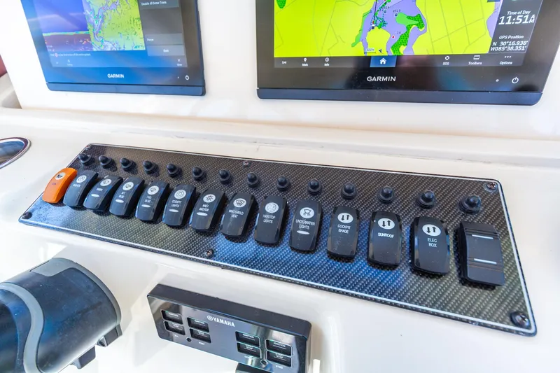  Yacht Photos Pics Control panel of 2020 Grady-White 370 Express boat with Garmin navigation displays.
