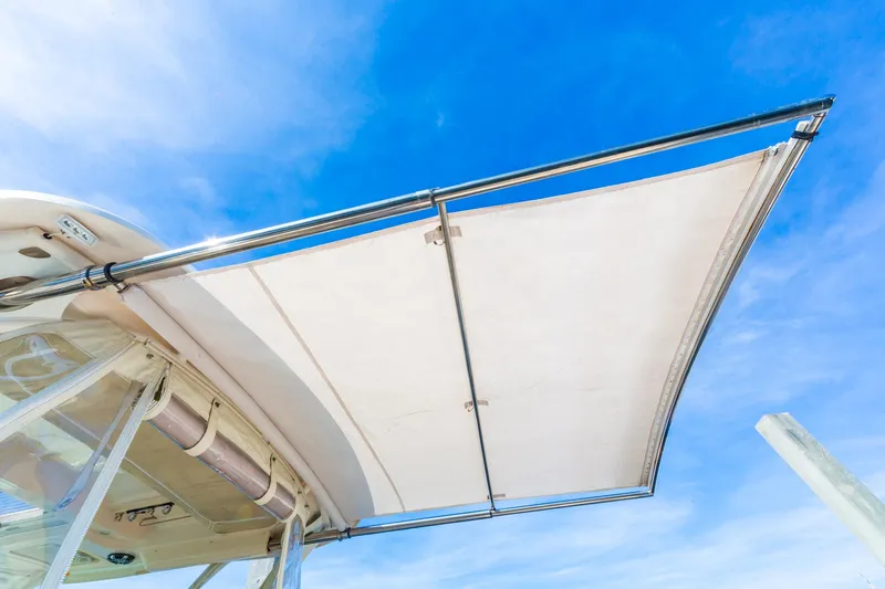  Yacht Photos Pics Grady-White 370 Express 2020 boat canopy against a clear blue sky.