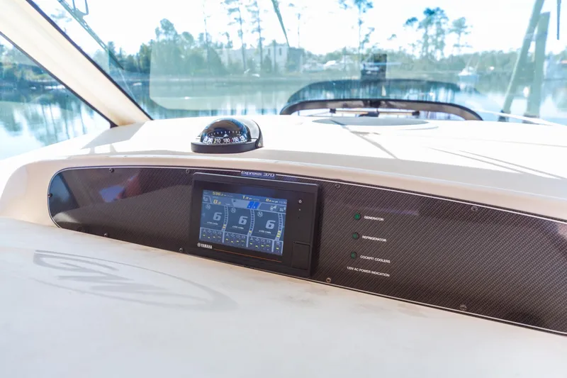  Yacht Photos Pics Dashboard of 2020 Grady-White 370 Express boat with navigation instruments and digital display.