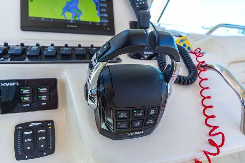  Yacht Photos Pics Control panel of 2020 Grady-White 370 Express boat with Yamaha throttle and navigation display.