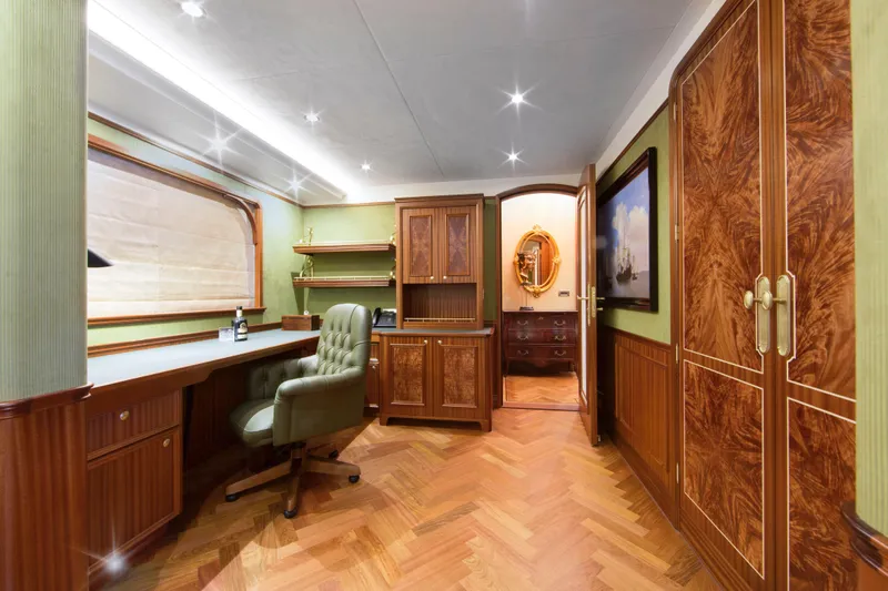  Yacht Photos Pics Luxurious office space on the 2026 Van der Valk Explorer 37M yacht with elegant wood finishes.