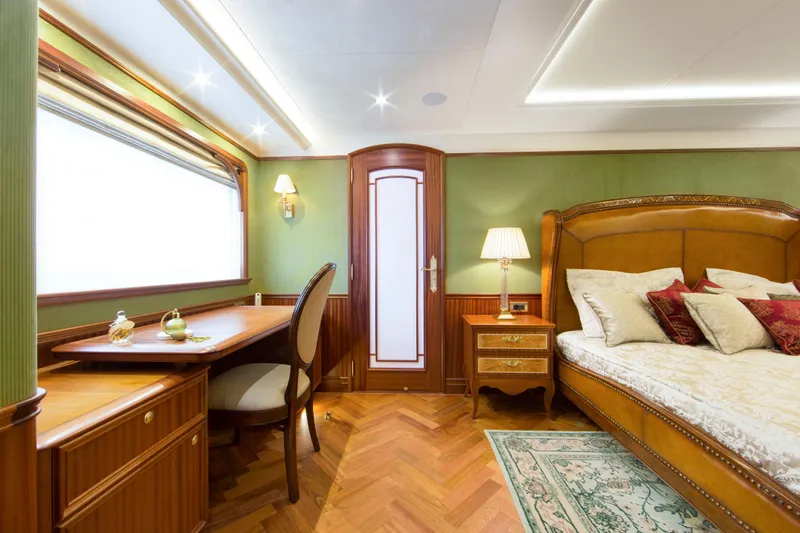  Yacht Photos Pics Luxurious bedroom interior of 2026 Van der Valk Explorer 37M yacht with elegant furnishings.