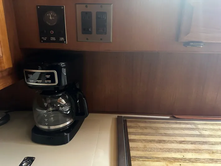 Last Dance Yacht Photos Pics Coffee maker in the kitchen of a 1987 Viking Boats 44 Motor Yacht.