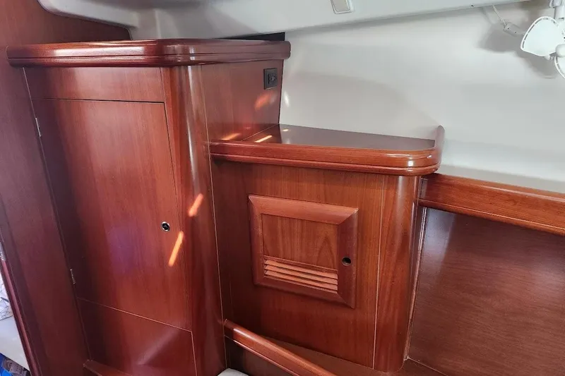 Rick B Yacht Photos Pics Interior wood cabinetry of a 2006 Beneteau 473 yacht, showcasing elegant design.