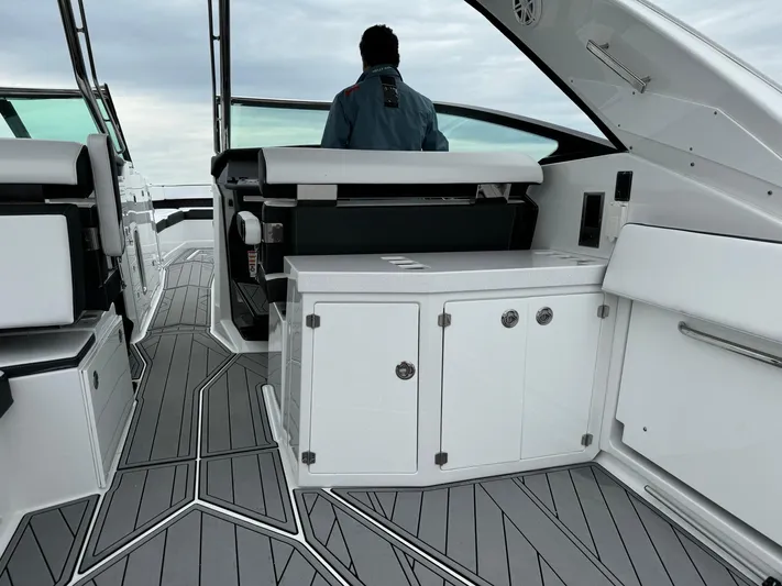  Yacht Photos Pics 2021 Monterey 385 Super Express boat interior with modern design and sleek cabinetry.