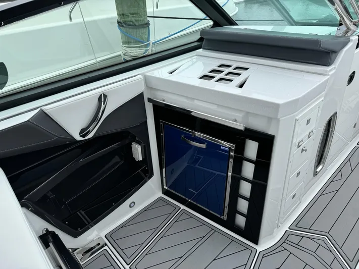  Yacht Photos Pics Interior of 2021 Monterey 385 Super Express boat with modern kitchenette.