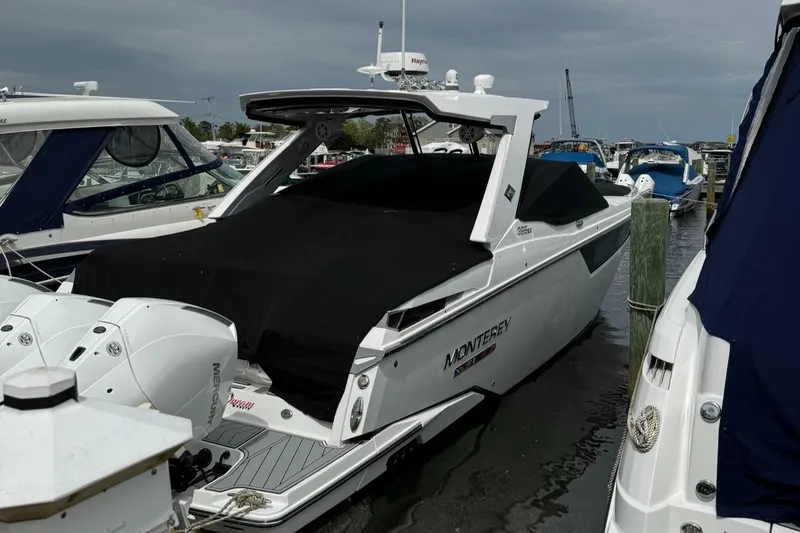  Yacht Photos Pics 2021 Monterey 385 Super Express yacht docked at marina.