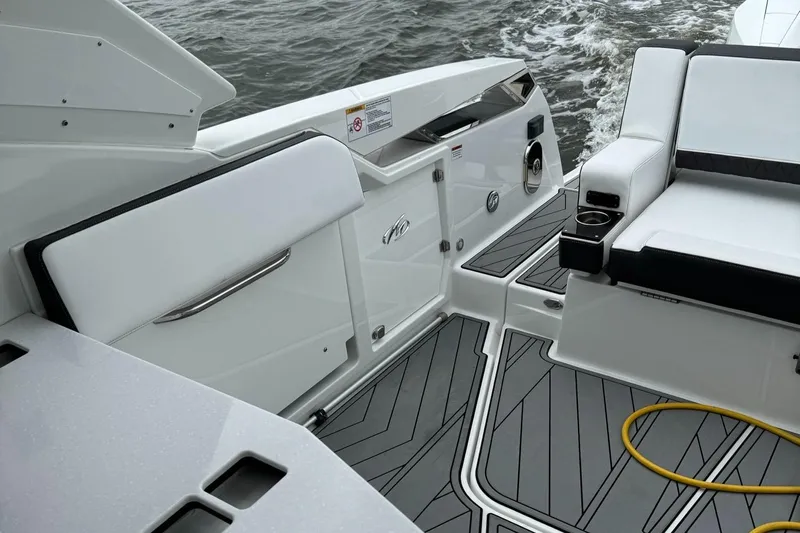  Yacht Photos Pics 2021 Monterey 385 Super Express boat interior with seating and deck.