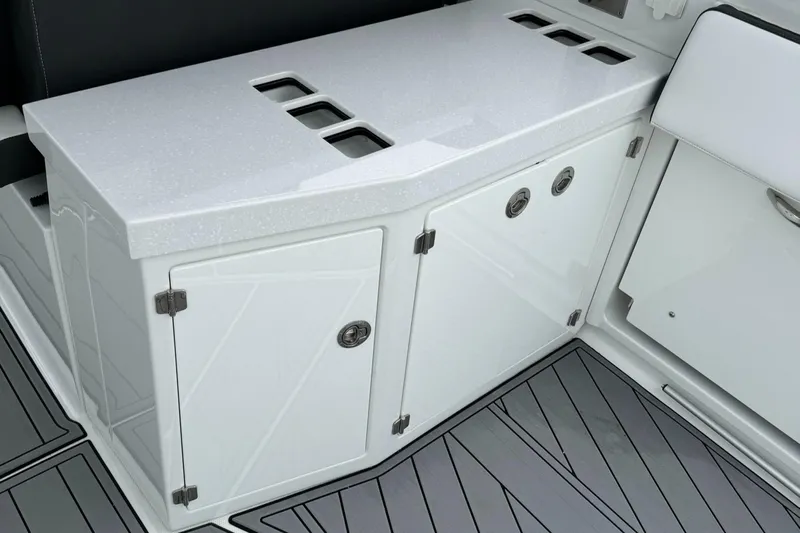  Yacht Photos Pics 2021 Monterey 385 Super Express boat interior storage cabinets and countertop.