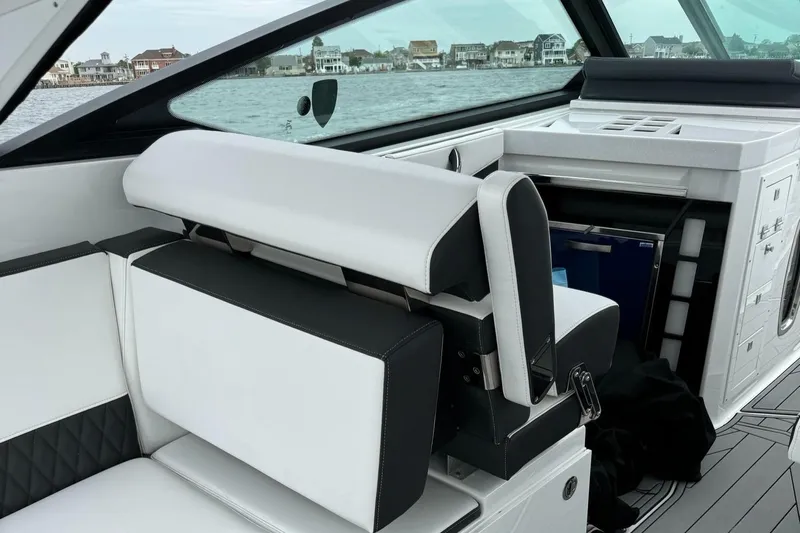  Yacht Photos Pics Interior of 2021 Monterey 385 Super Express boat with white and black seating.