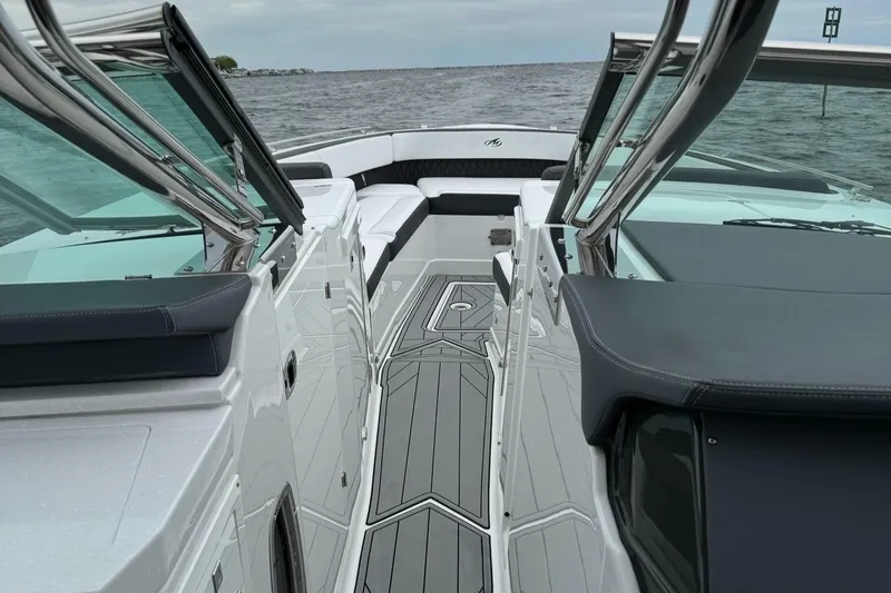  Yacht Photos Pics 2021 Monterey 385 Super Express boat interior with sleek design on open water.