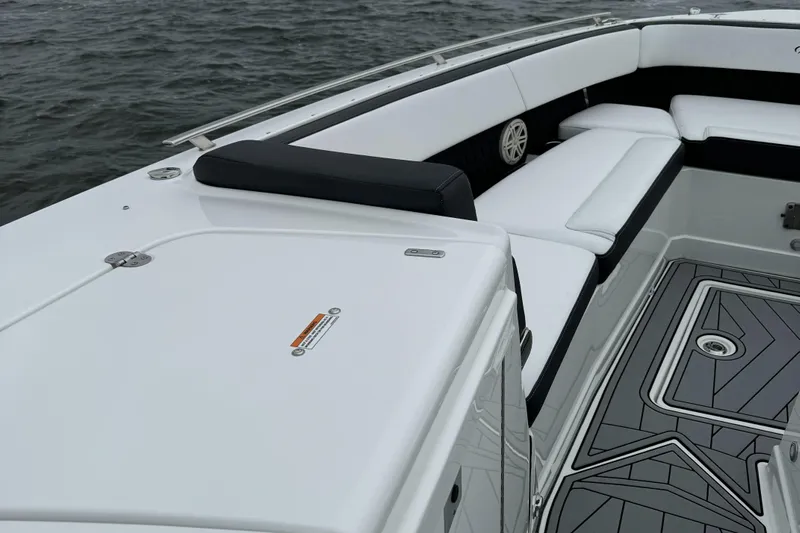  Yacht Photos Pics 2021 Monterey 385 Super Express boat interior with white seating and gray flooring.