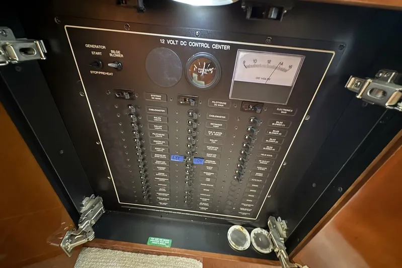 Carlet Vivian IV Yacht Photos Pics 2004 Carver 56 Voyager 12-volt DC control center with switches and gauges.