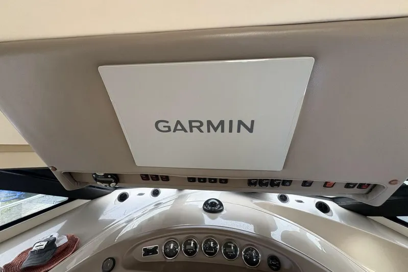 Carlet Vivian IV Yacht Photos Pics Garmin navigation system in 2004 Carver 56 Voyager yacht cockpit.