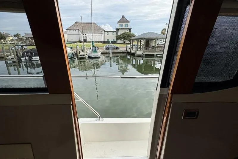 Carlet Vivian IV Yacht Photos Pics View from 2004 Carver 56 Voyager yacht, overlooking marina and docked boats.