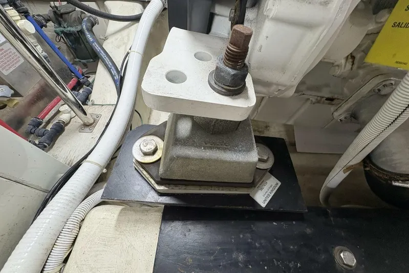 Carlet Vivian IV Yacht Photos Pics Engine mount detail of a 2004 Carver 56 Voyager yacht, showcasing mechanical components and wiring.