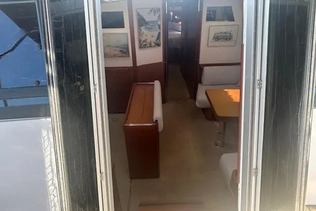  Yacht Photos Pics Interior view of 2013 Beneteau Sense 46 yacht, featuring elegant seating and decor.