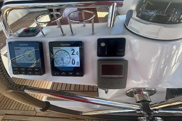  Yacht Photos Pics Control panel of a 2013 Beneteau Sense 46 yacht with navigation instruments.