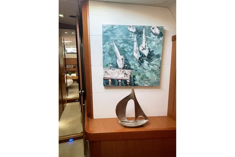  Yacht Photos Pics Interior of 2013 Beneteau Sense 46 yacht with nautical artwork and sculpture.