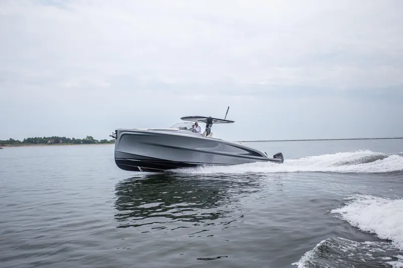  Yacht Photos Pics 2024 Solaris Power 40F Open yacht cruising on calm waters.