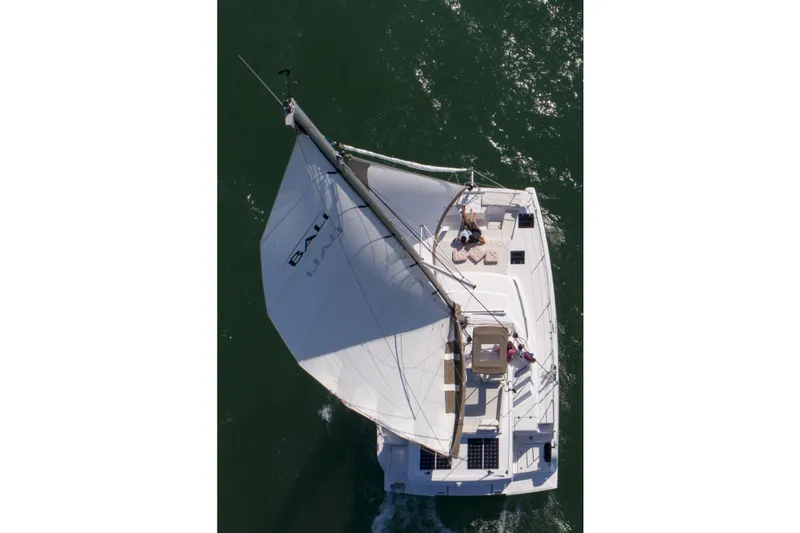  Yacht Photos Pics Aerial view of 2026 Bali CATSPACE sailing catamaran on open water.