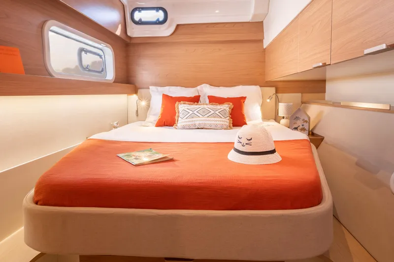  Yacht Photos Pics Luxurious 2026 Bali CATSPACE yacht cabin with cozy bed and stylish decor.