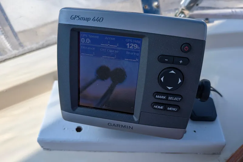 Fishers Folly IV Yacht Photos Pics Garmin GPSmap 440 on 1988 Offshore Yachts 48 Yachtfisher, displaying navigation data.