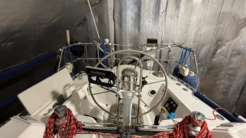 Elan Yacht Photos Pics 1989 J Boats J/40 sailboat cockpit with Garmin navigation system and red ropes.