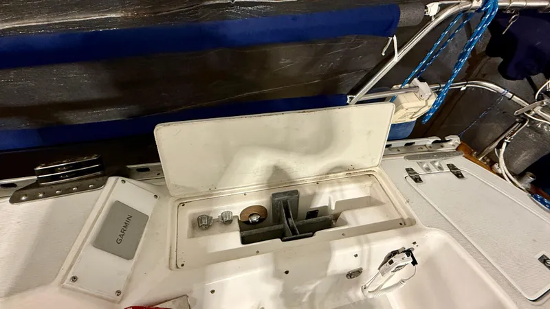 Elan Yacht Photos Pics 1989 J Boats J/40 cockpit with open storage compartment and Garmin equipment.