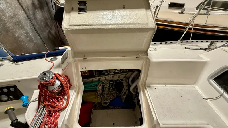 Elan Yacht Photos Pics 1989 J Boats J/40 sailboat cockpit storage with ropes and equipment.