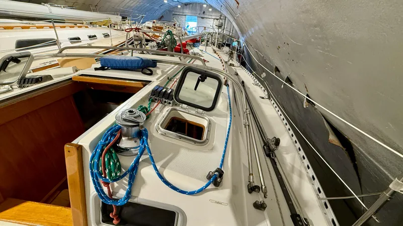 Elan Yacht Photos Pics 1989 J Boats J/40 sailboat deck with rigging and equipment in storage.