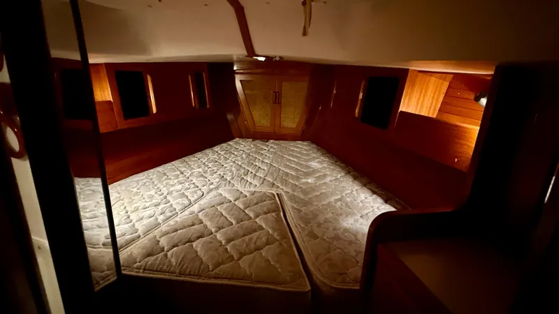 Elan Yacht Photos Pics 1989 J Boats J/40 interior cabin with wooden finish and mattress.