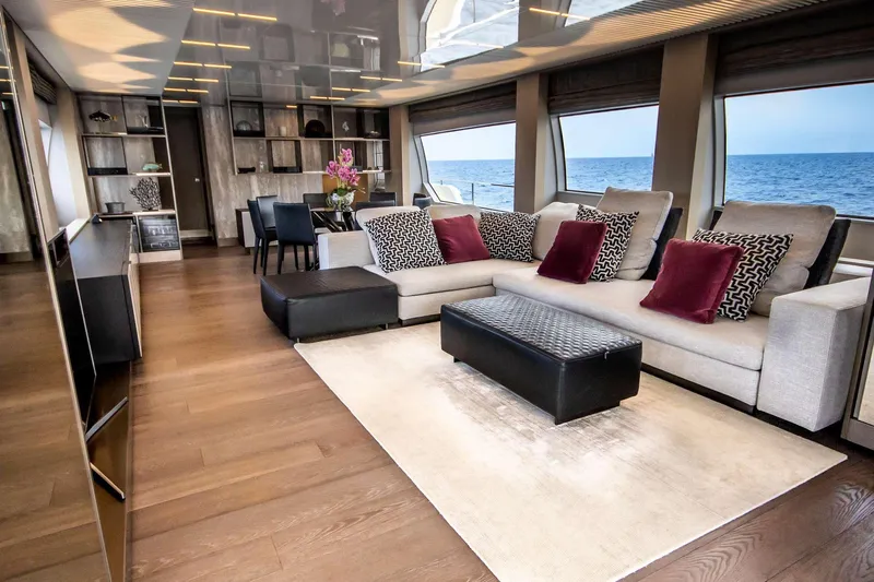 E3 Yacht Photos Pics Luxurious interior of 2019 Ferretti Yachts 850 with elegant seating and ocean view.