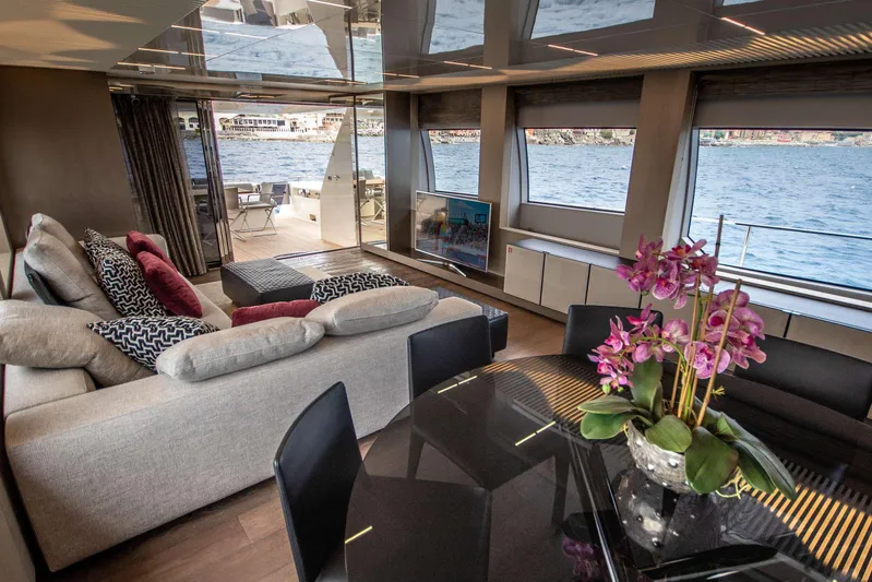 E3 Yacht Photos Pics Luxurious interior of 2019 Ferretti Yachts 850 with elegant decor and ocean view.