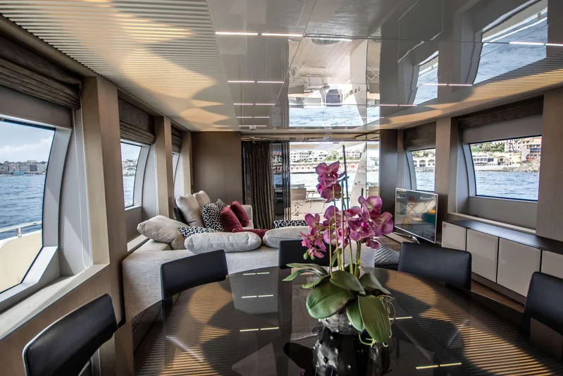 E3 Yacht Photos Pics Luxurious interior of 2019 Ferretti Yachts 850 with elegant decor and waterfront views.