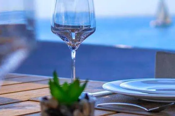 E3 Yacht Photos Pics Elegant table setting on Ferretti Yachts 850, 2019, with ocean view.