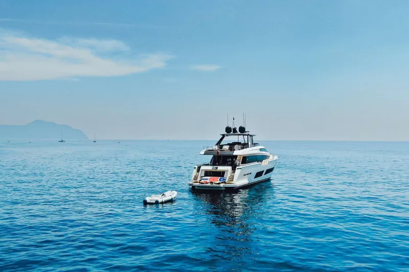 E3 Yacht Photos Pics 2019 Ferretti Yachts 850 on calm blue sea with clear sky.