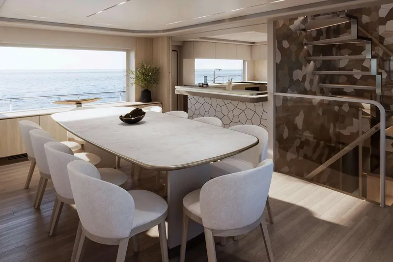  Yacht Photos Pics Luxurious Nomad 101 yacht interior with elegant dining area and ocean view, 2026 model.