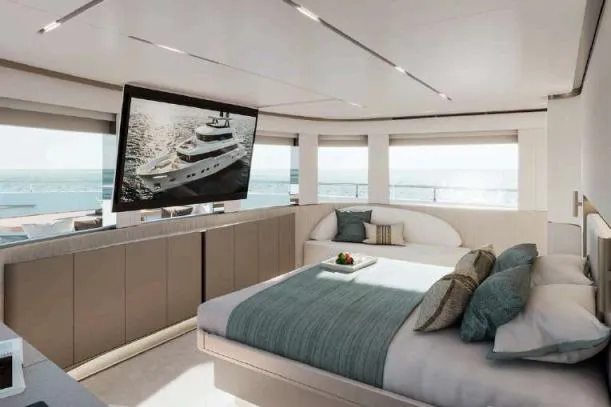  Yacht Photos Pics Luxurious Nomad 101 yacht bedroom interior, featuring modern design and ocean views, 2026 model.