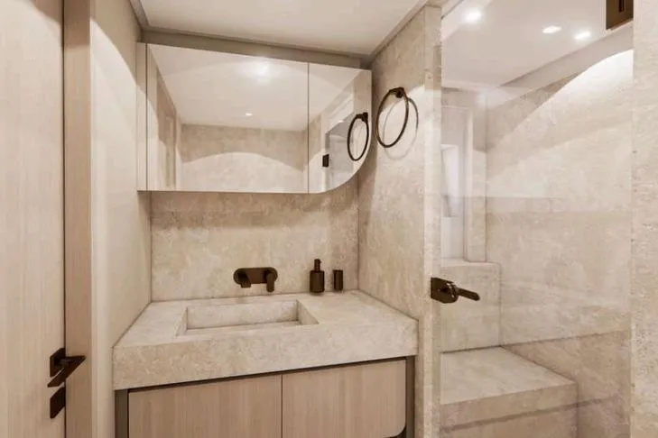  Yacht Photos Pics Modern bathroom in Nomad 101, 2026 model, featuring sleek design and neutral tones.