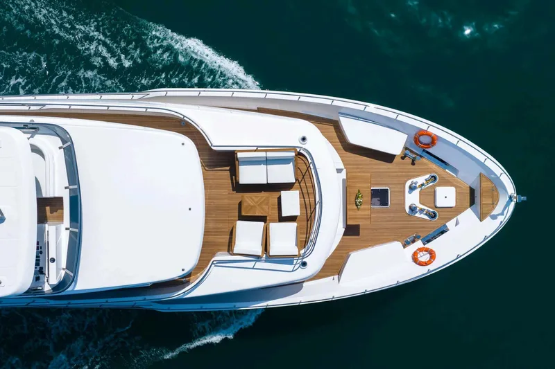  Yacht Photos Pics Aerial view of luxurious Nomad 101 yacht, 2026 model, cruising on open water.