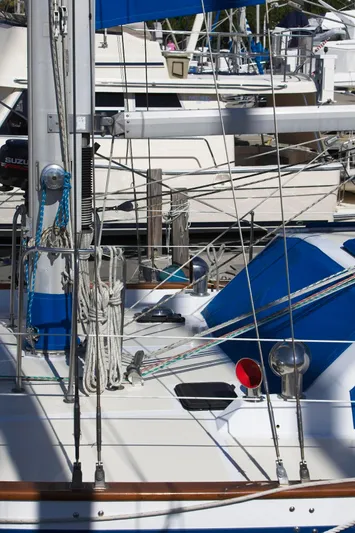 Aries Yacht Photos Pics Sailboat deck with rigging, Sea Star 46, 1982 model, docked in marina.