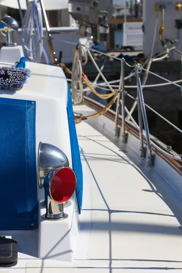 Aries Yacht Photos Pics 1982 Sea Star 46 sailboat deck with ropes and equipment in marina.