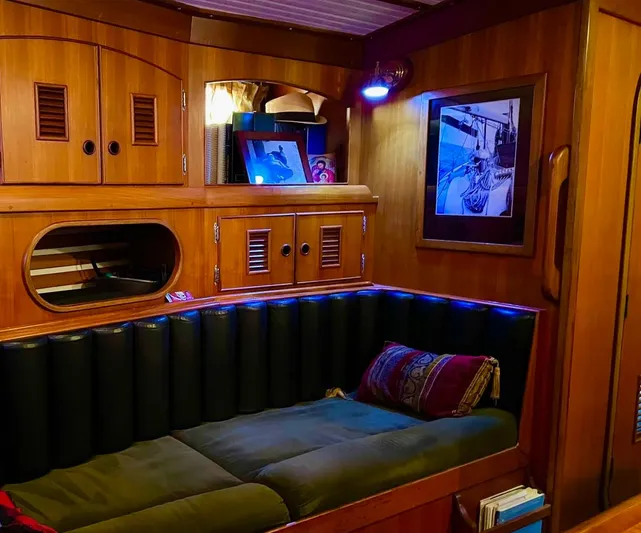 Aries Yacht Photos Pics Cozy 1982 Sea Star 46 yacht interior with wood paneling, cushioned seating, and nautical decor.