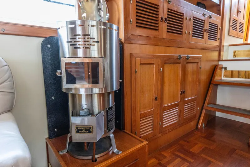 Points North III Yacht Photos Pics 1986 Kadey-Krogen 42 interior with wood cabinetry and Dickinson Antarctic heater.
