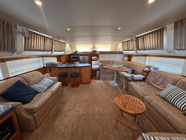 Yacht Photos Pics Luxurious interior of 2002 Carver 466 Motor Yacht with plush seating and modern amenities.