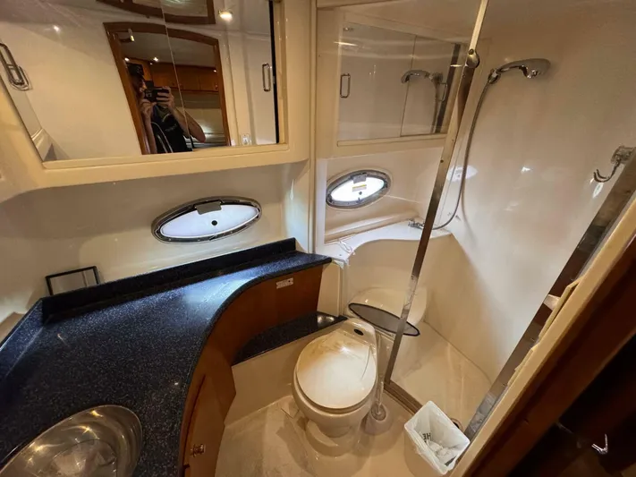  Yacht Photos Pics Bathroom interior of 2002 Carver 466 Motor Yacht with shower and vanity.