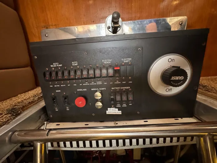  Yacht Photos Pics Control panel of a 2002 Carver 466 Motor Yacht with various switches and dials.